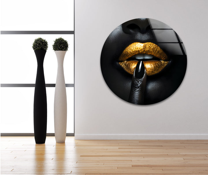 Elegant black lips with gold tones on glass, offering a chic and bold statement for your walls.