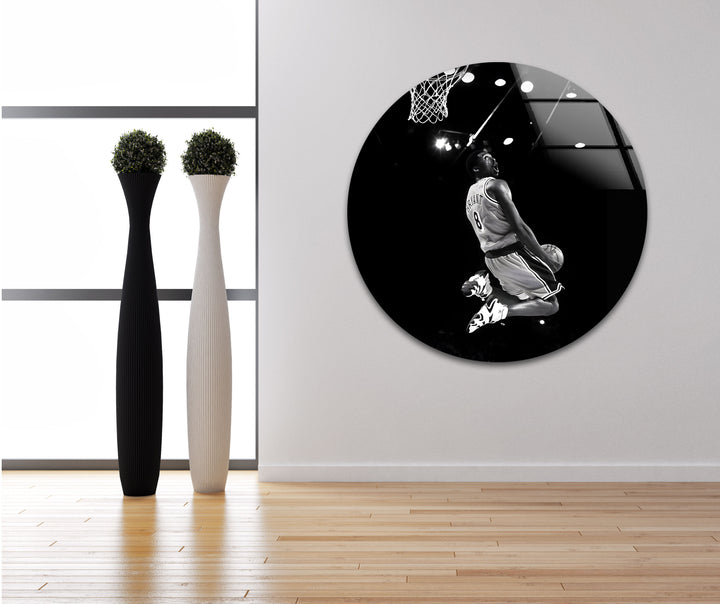 A tribute to the unmatched skill and passion of Kobe Bryant, frozen in time on black and white glass.

