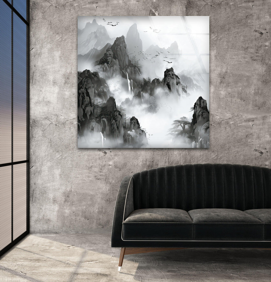 Elegant black and white nature art featuring layered mountains, forested ridges, and soft clouds.