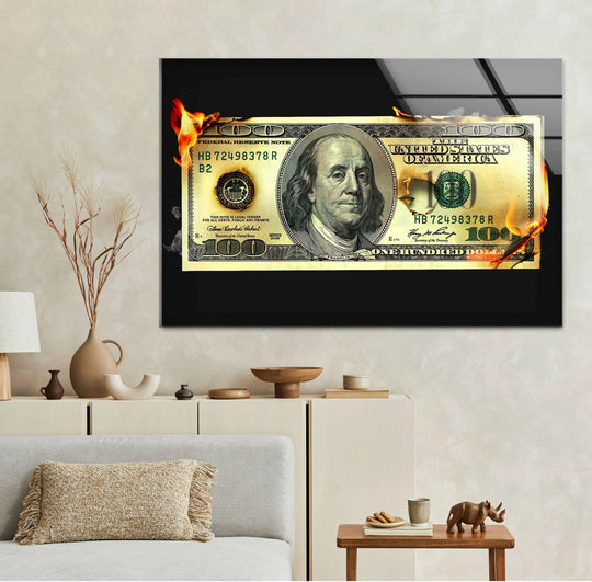 Bold contrast between burning US dollar and stark black background in this tempered glass wall art.