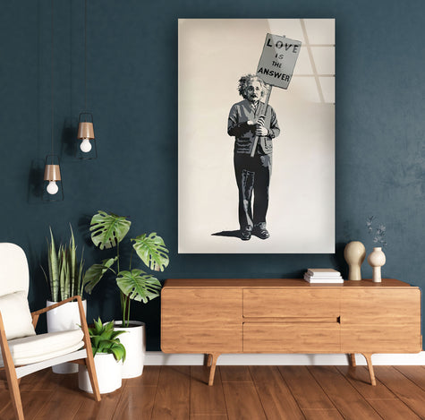 a living room with a painting of a man holding a sign