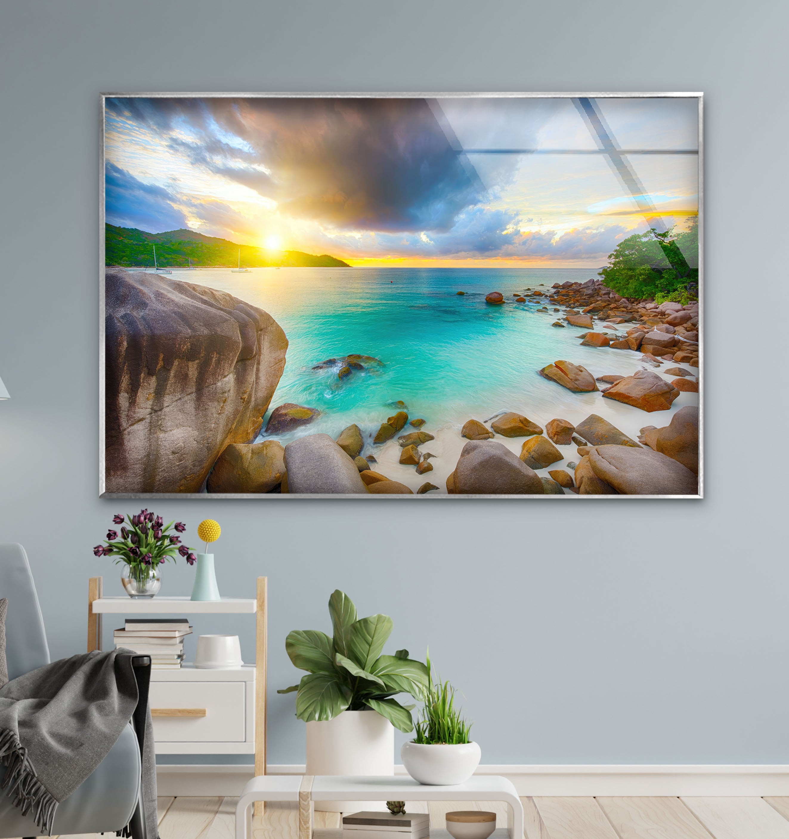 a room with a large picture hanging on the wall