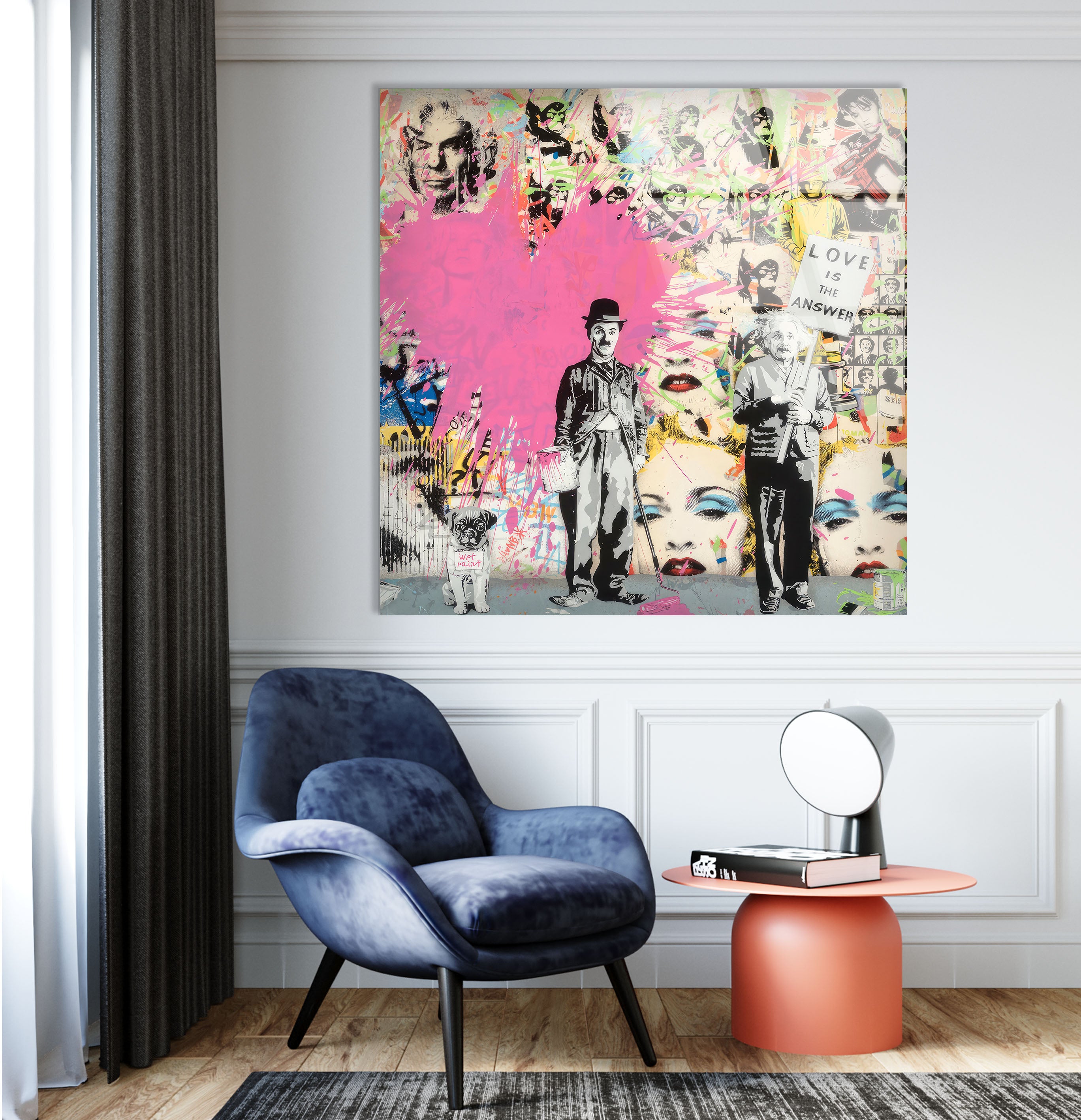 a living room with a blue chair and a pink painting