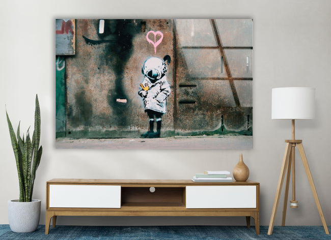 a painting of a little girl with a heart on a wall