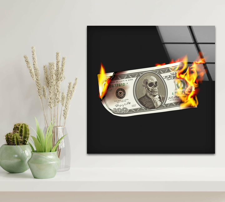 a picture of a dollar bill on fire