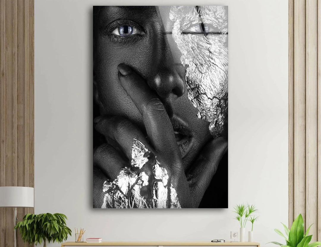 Premium black and white wall art featuring silver foil facial accents and intense blue eyes.