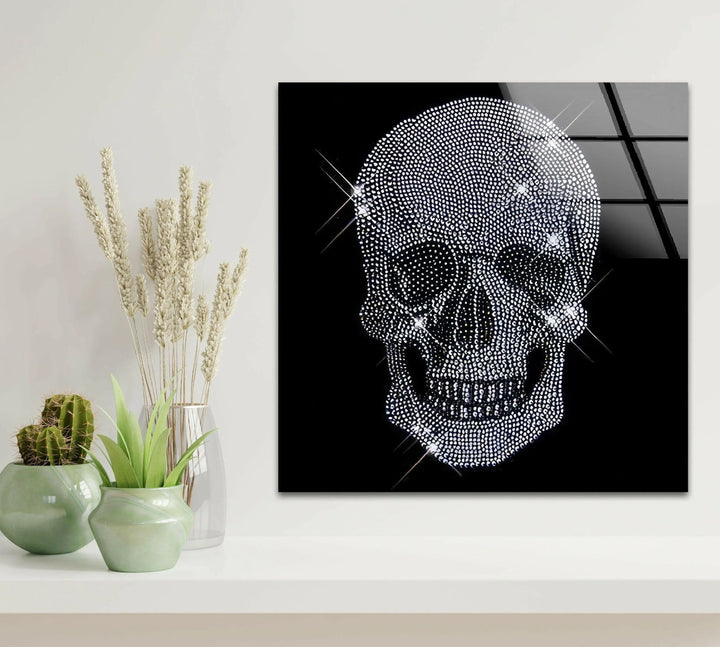 Shiny monochrome skull design printed on glass with jewel-like texture and star-like glints.