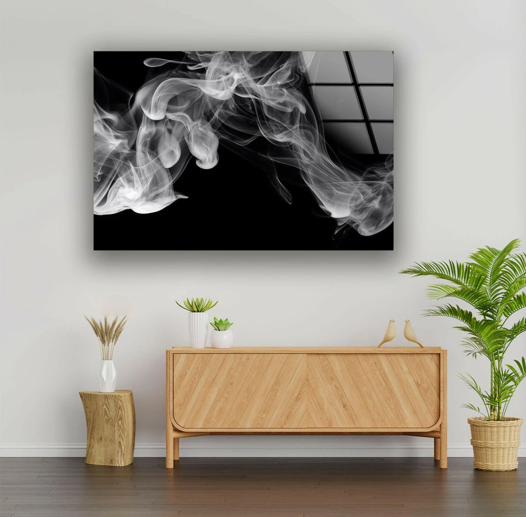 Soft white smoke forms on a black backdrop printed on tempered glass creating modern abstract decor.
