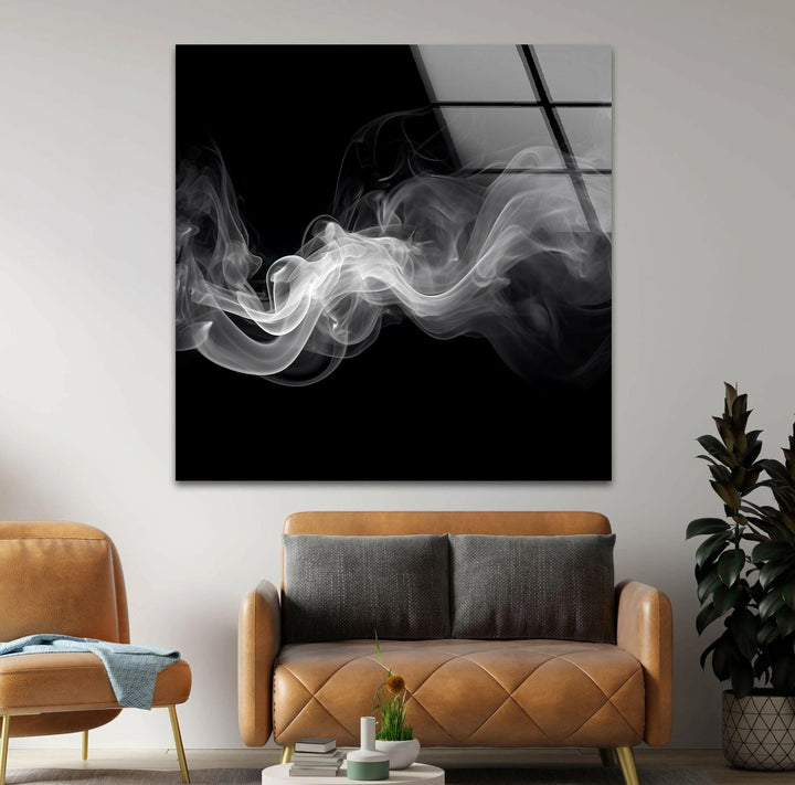 Atmospheric monochrome art showing wisps of white smoke moving across deep black.