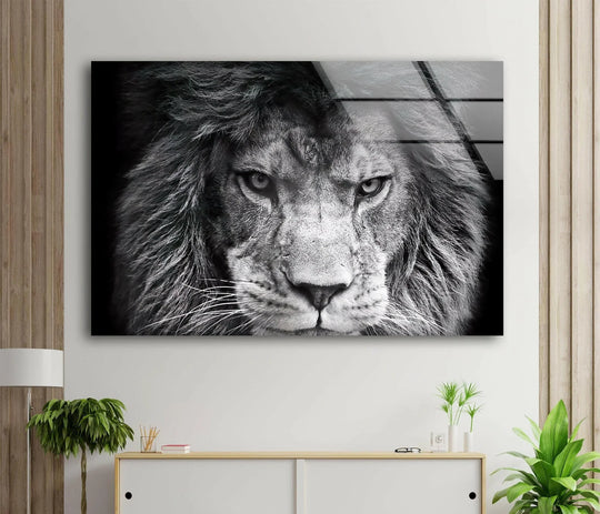Monochrome lion face showcasing powerful eyes and rich texture printed on glass décor.