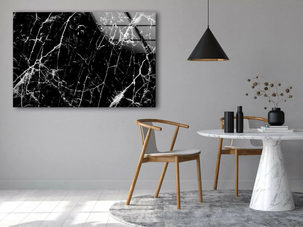 High-contrast marble pattern featuring intricate white cracks on deep black glass décor.