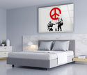 a bed in a room with a peace sign on the wall