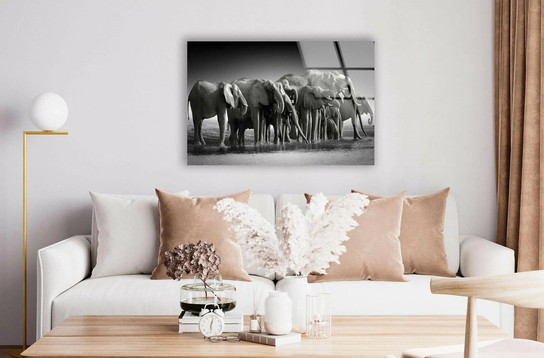 Wildlife-inspired monochrome decor featuring elephants drinking by the water’s surface.