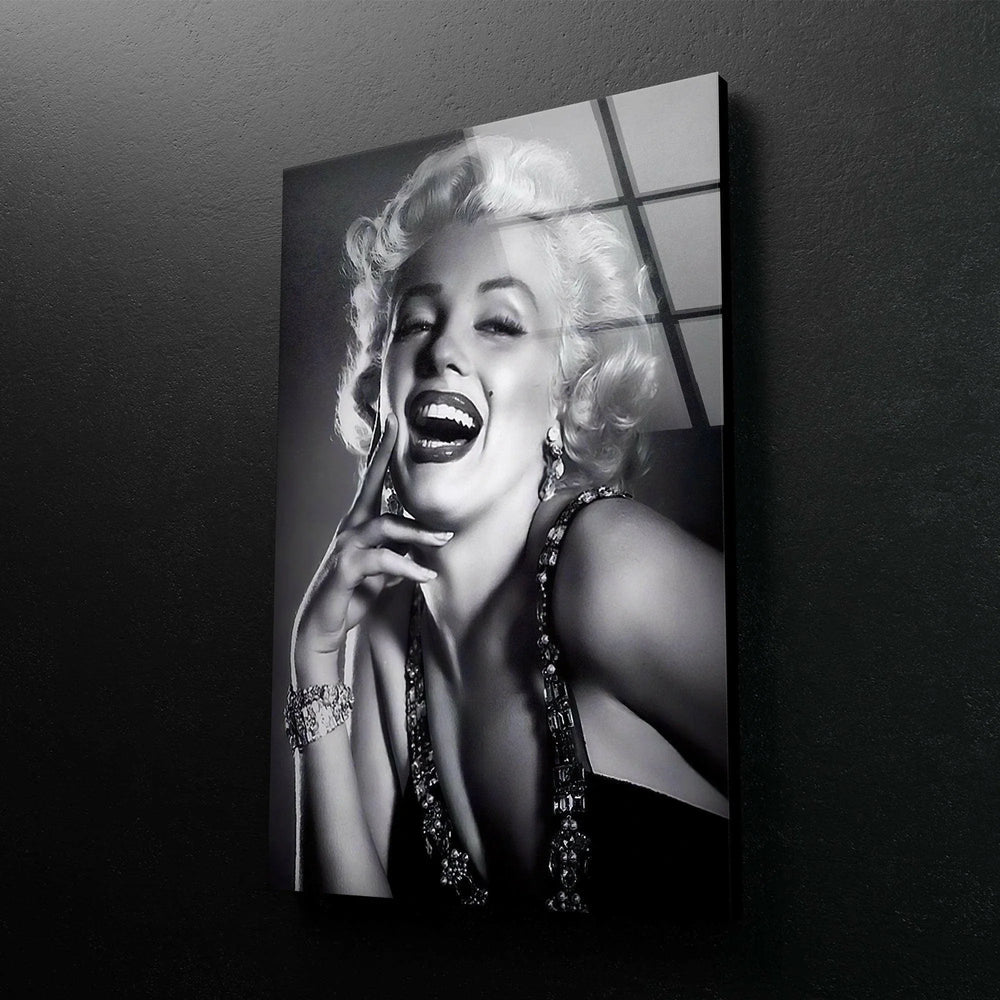 Marilyn Monroe Black and white glass wall art featuring a glamorous smiling woman with vintage Hollywood styling.