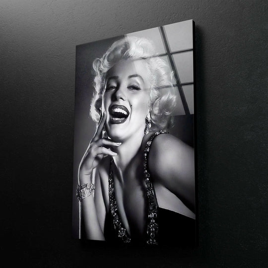 Marilyn Monroe Black and white glass wall art featuring a glamorous smiling woman with vintage Hollywood styling.