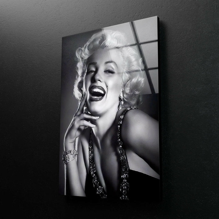 Marilyn Monroe Black and white glass wall art featuring a glamorous smiling woman with vintage Hollywood styling.