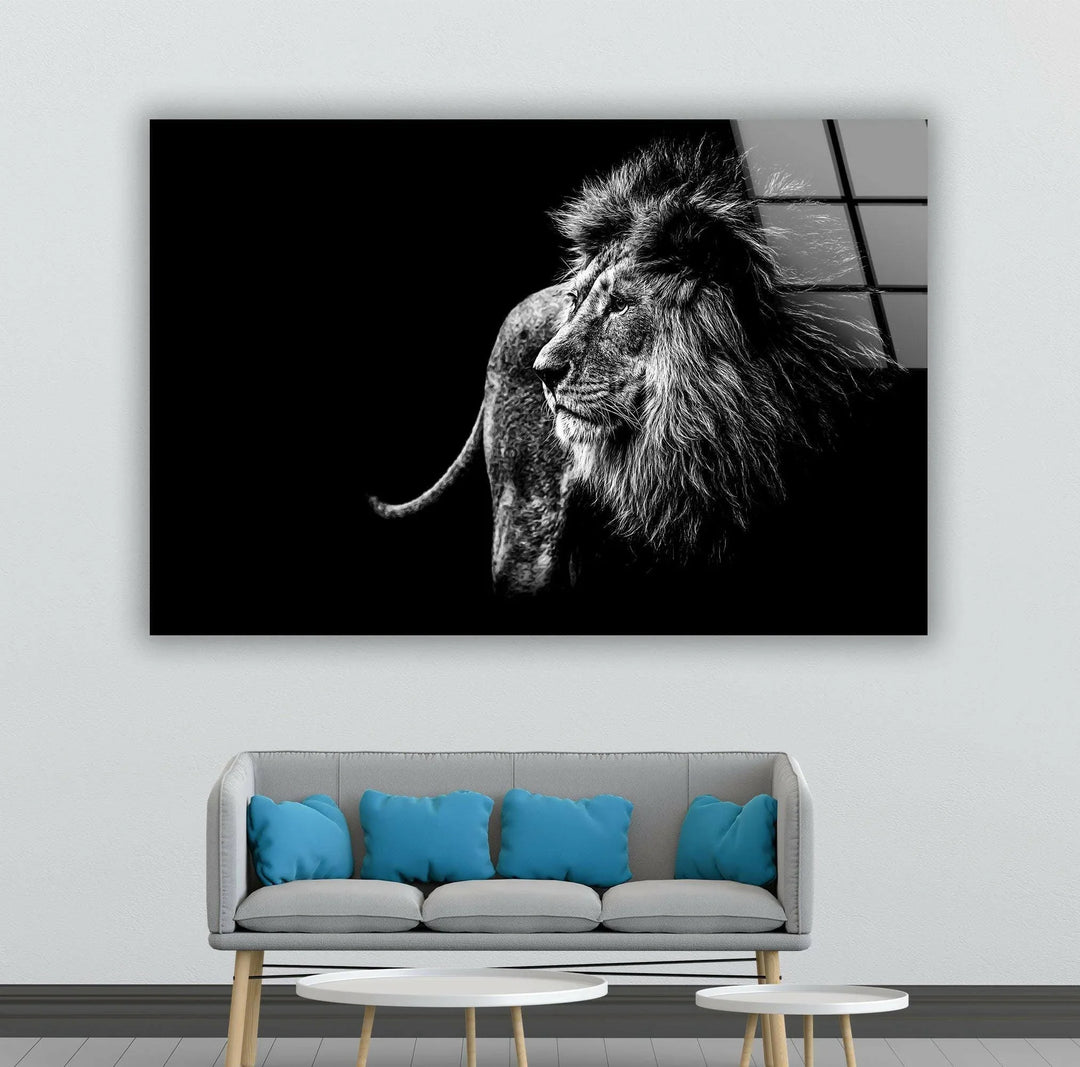 Black and white glass wall art featuring a majestic lion in profile against a dark background.