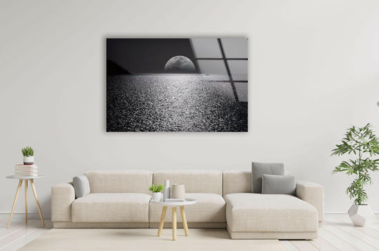 The landscape glass wall art shows a mesmerizing moonlit ocean reflection and a tranquil night scene and is a perfect statement piece for modern interiors and a stunning night sky landscape on glass wall art