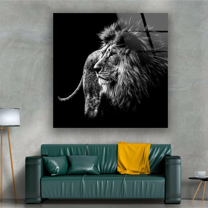 Artistic monochrome depiction of a lion standing proudly in shadow and light.