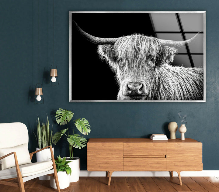 Monochrome decor piece featuring a detailed highland cow illustration against a solid black backdrop.