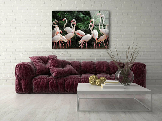 The animal is Group White Flamingos glass wall art and elegant wildlife decor with a group of flamingos against tropical leaves and the white finish adds modern bird art on a white wall