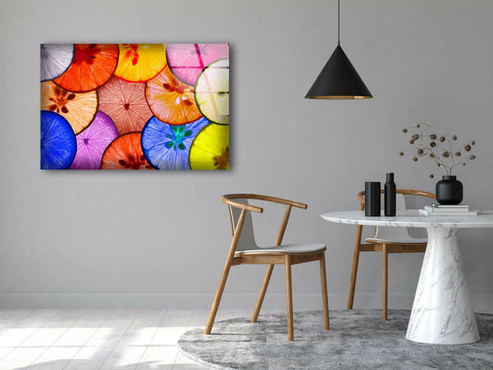 Vibrant glass art featuring a dominant spectrum of colorful citrus slices, adding a refreshing and abstract touch.