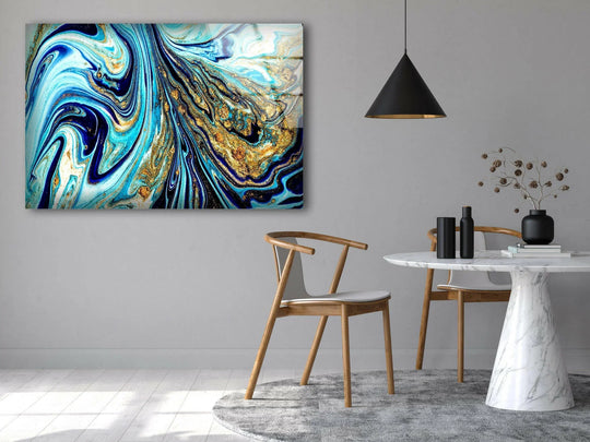 Abstract glass wall art with swirling navy, azure, and gold veins, forming a unique modern wall decor with flowing geometric patterns.