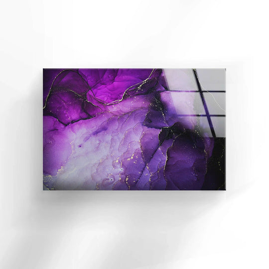Evoking a luxurious, mysterious mood, this abstract glass wall art features deep purple hues and hints of gold in this stunning wall print.