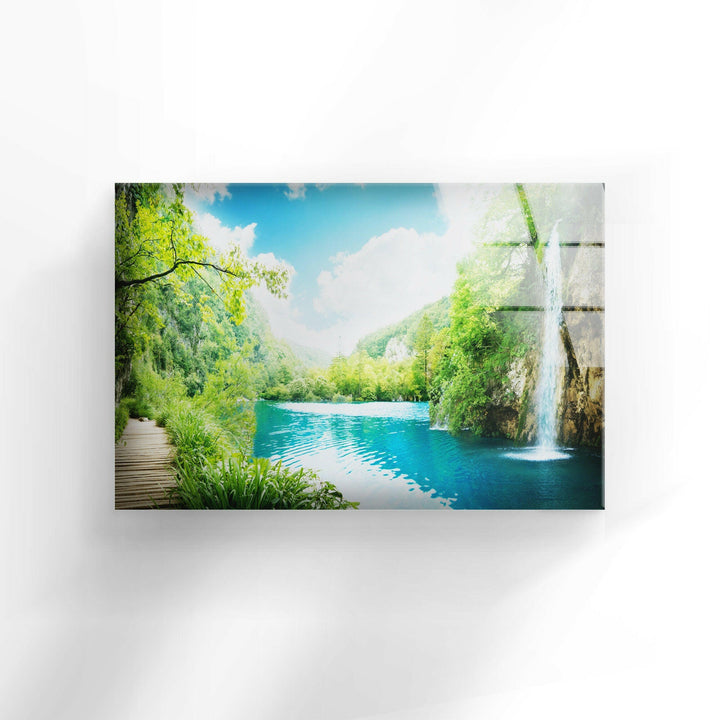 Scenic Waterfall and Lush Greenery – A Breathtaking Glass Print
