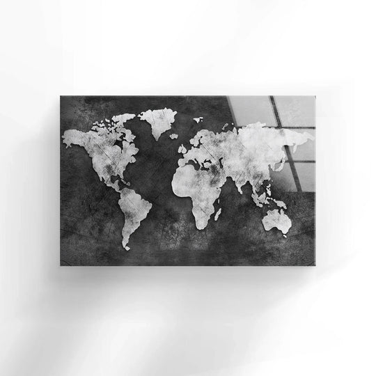 Minimalist black and white world map with distressed texture for contemporary décor.