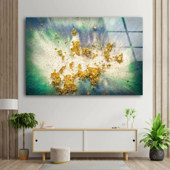 Vibrant blues and greens create a rich color saturation in this abstract epoxy art from glass, accented with shimmering gold leaf.