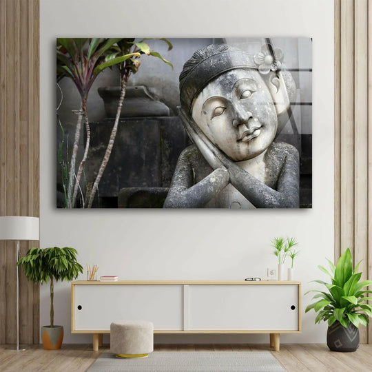 Cool Art glass wall art features a Hindu statue with a flower accent and temple backdrop and vibrant zen decor