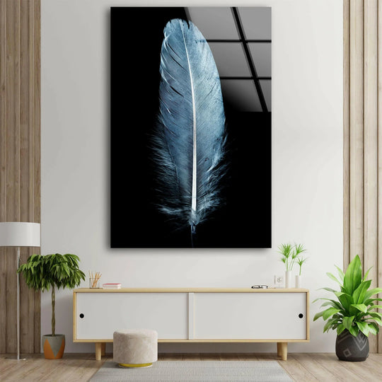 Vertical, rectangular glass wall art decor featuring a large, detailed blue feather on a black background.