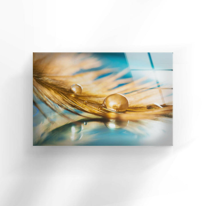 Goldener Tropfen auf der Feder, Glaswandkunst