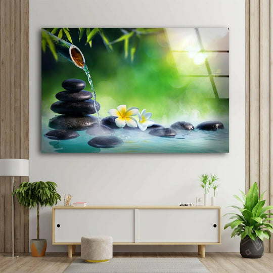 Dark, stacked spa stones rest in tranquil water, a serene element of this decorative wall art.