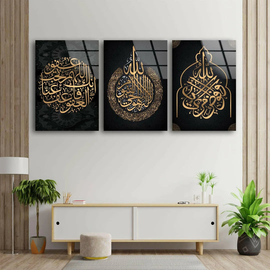 Islamic religious calligraphy glass wall art shows gold Arabic script and religious design and is elegant decor and religious decor on a white wall