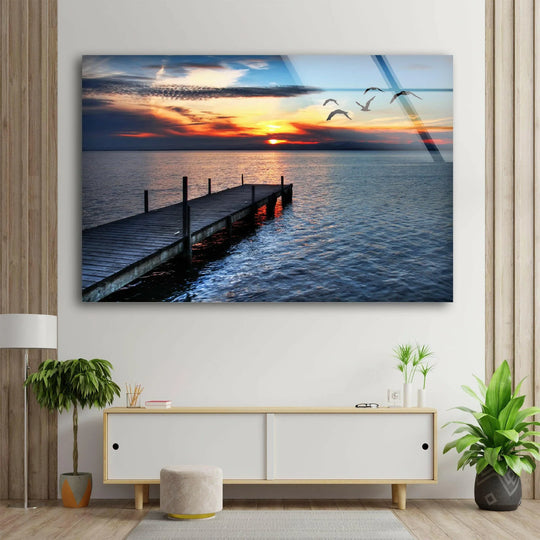 Landscape glass wall art birds flying into sunset and Birds Flock in The Sunset and nature landscape art and soaring birds over the ocean