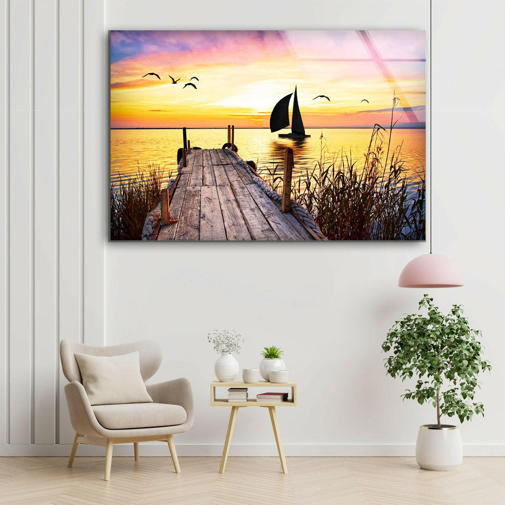 Tranquil Dockside Sunset with Sailboat – High-Definition Glass Print
