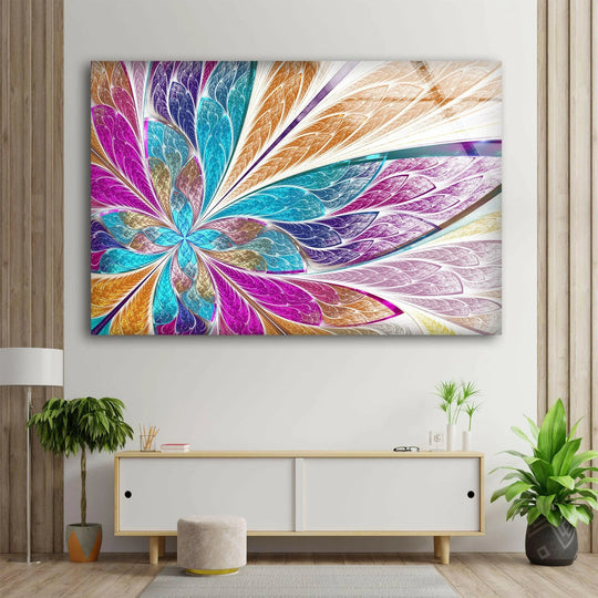 Negative space surrounds vibrant pink, purple, and blue stained glass art, featuring fractal floral petals.