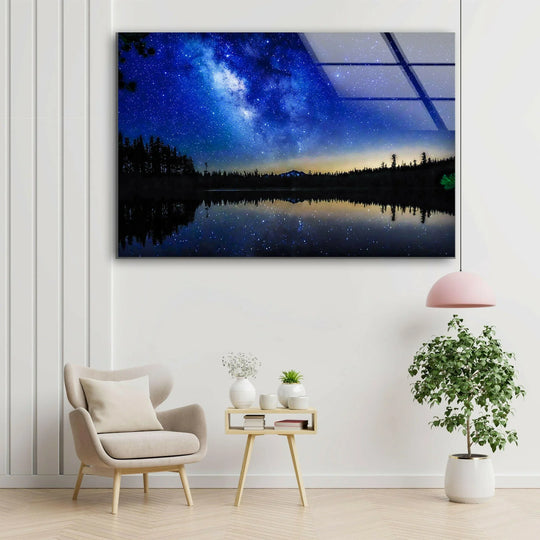 The brightest area features a stunning glass wall art night sky, displaying a beautiful Milky Way reflection, perfect for adding celestial home decor.
