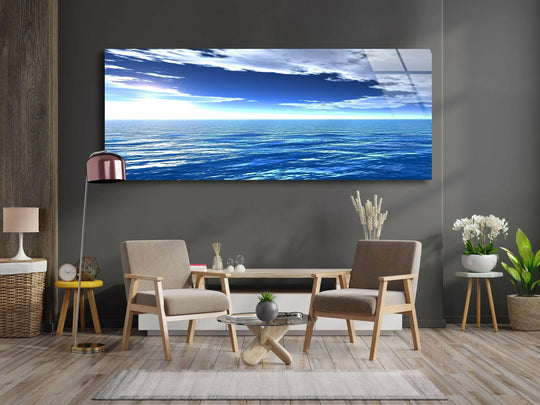 Ocean and Blue Sky glass wall art shows a tranquil ocean landscape and blue sky and is panoramic wall art perfect for serene coastal decor