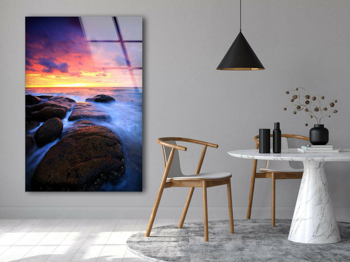 Stunning ocean sunset with soft waves and a vibrant sky, captured in high-definition glass print.
