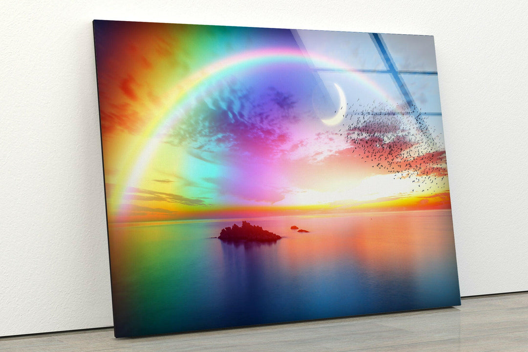 Surreal Sky with Colorful Rainbow and Moonlit Ocean
