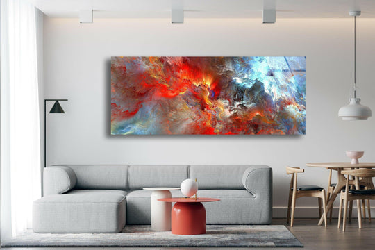 Red grey cloud abstract glass wall art features a vibrant panoramic design and bold colors displayed above a grey sofa in a living room
