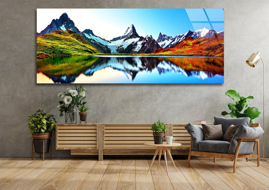 Lake Bachalpsee glass wall art showcases a scenic mountain landscape and vibrant reflections and is a stunning piece of large wall art for modern wall decor above a sofa