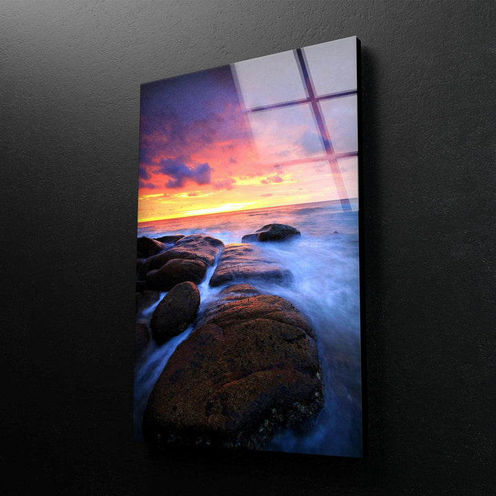 Tranquil beach sunset with crashing waves and warm evening colors, printed on glass.
