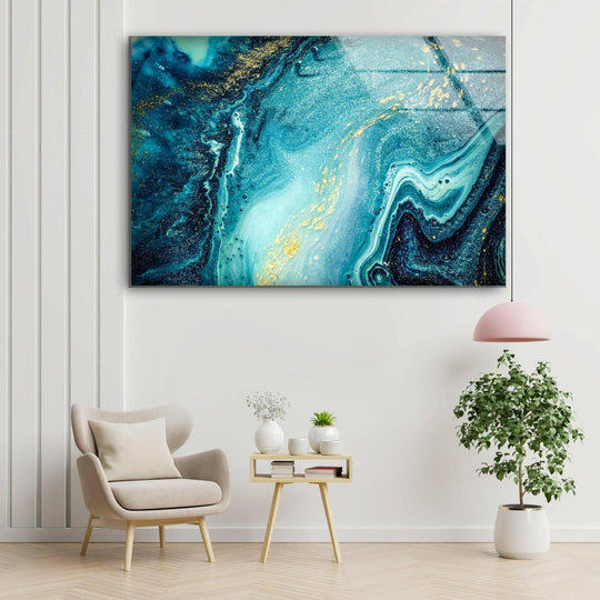 Textured swirls of sapphire and azure acrylic ink, infused with shimmering gold flecks, adorn this glass home decor.