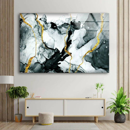 A modern glass wall art decor piece showcases a striking depth with swirling layers of gold, white, and black abstract marble.