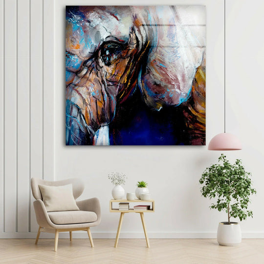 Elephant glass wall art shows an abstract animal and wildlife decor on a white wall and is a vibrant animal wall art centerpiece and glass art decor