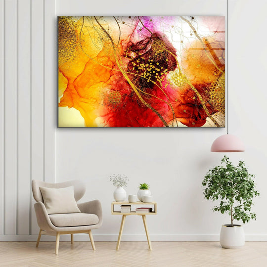 A serene gold color splash abstract glass wall art composition evokes stillness within a modern living space.